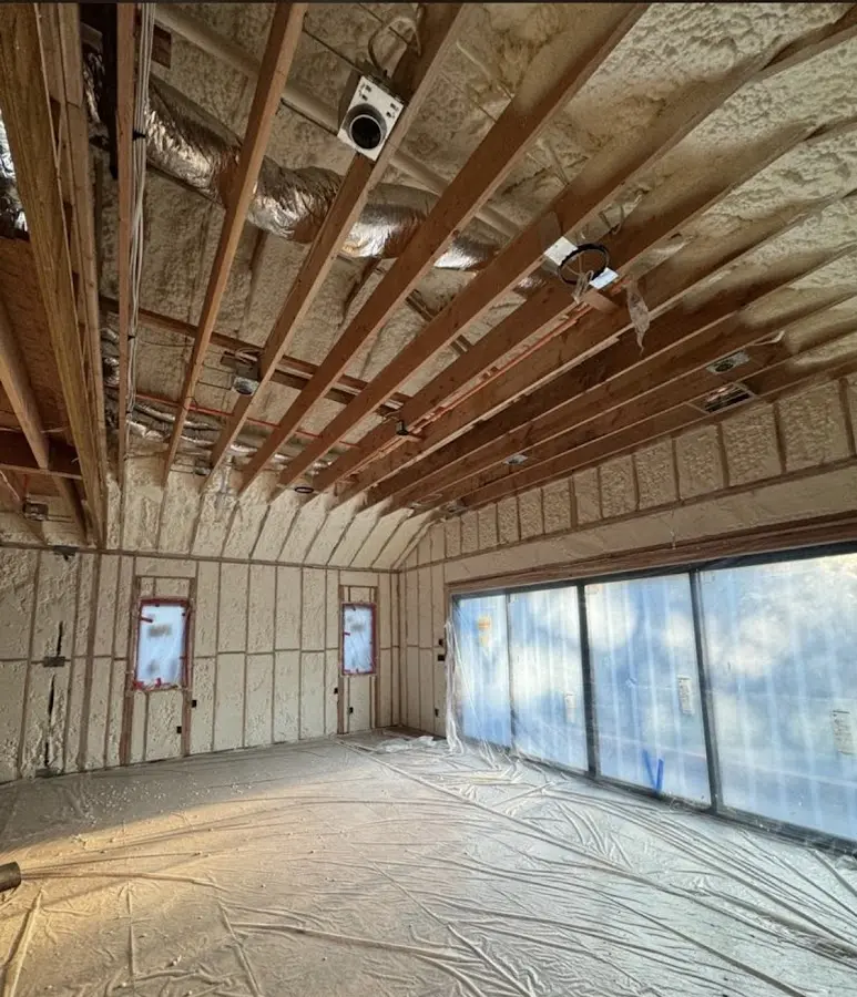 Interior walls and ceiling insulated with spray foam during new construction in Manteca
